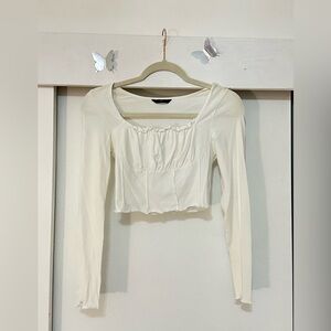 White long sleeve top